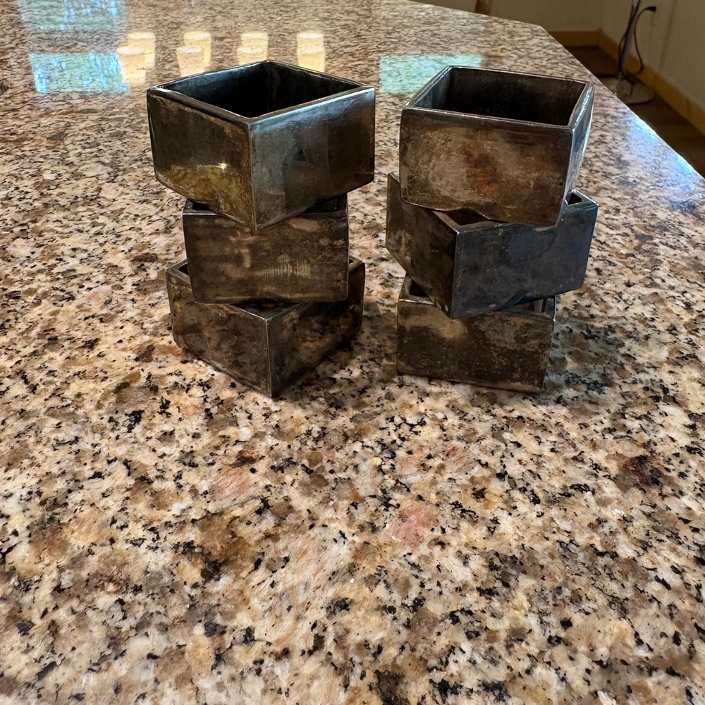 Set of six silver plated napkin rings.